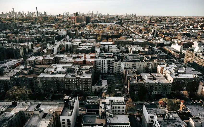 Aerial view of Brooklyn with the Manhattan skyline beyond